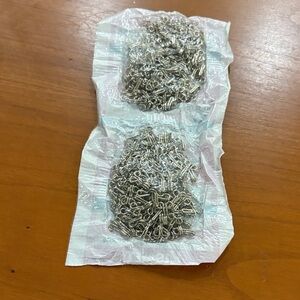 Kismet Nickel size 2 Dress Hooks. 200 dress hooks. NEW in sealed pack.